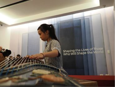 Student playing the guzheng